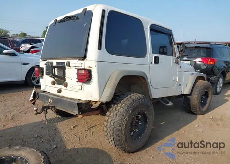 1999 Jeep Wrangler Sport z USA, uszkodzony, nr VIN 1J4FY19S2XP493947